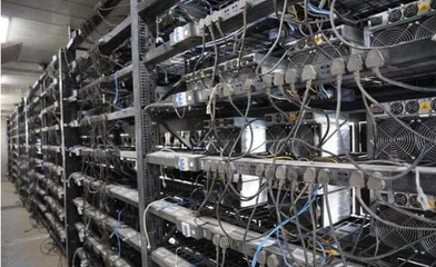 BlueChain Hosting's Alephium mining farm showcasing advanced cooling and rack systems