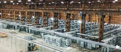 A high-tech mining farm showcasing advanced cooling systems for ASIC miners